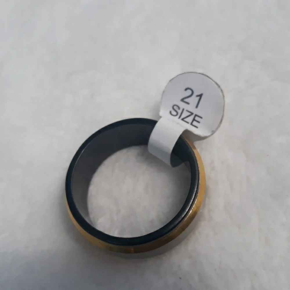 Gold, silver, and black men's spinner ring size 11.5